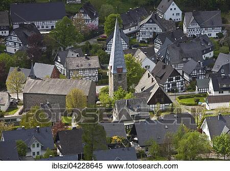 Half-timbered houses and parish church of St Cyriac, Bruchhausen, Olsberg, Sauerland, North Rhine-Westphalia, Germany, Europe View Large Photo Image Stock Photography - Half-timbered houses and parish church of St Cyriac, Bruchhausen, Olsberg, Sauerland, North Rhine-Westphalia, Germany, Europe. Fotosearch