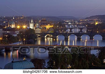 Stock Photograph - iew from the Letna hill on Moldova and bridges at night, Prague, Czech Republic, Europe. Fotosearch