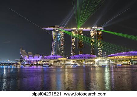 Laser show at Marina Bay Sands Hotel in the evening, Marina Bay, Singapore, Asia View Large Photo Image Stock Image - Laser show at Marina Bay Sands Hotel in the evening, Marina Bay, Singapore, Asia. Fotosearch
