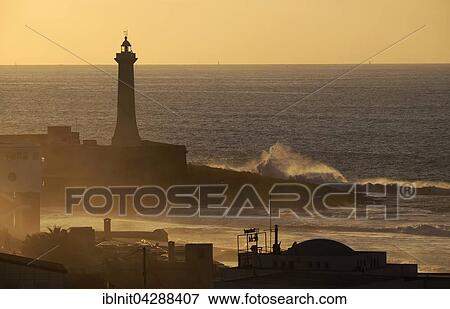 Lighthouse in the evening, Atlantic Ocean, Rabat, Rabat province, Morocco, Africa View Large Photo Image Stock Photo - Lighthouse in the evening, Atlantic Ocean, Rabat, Rabat province, Morocco, Africa. Fotosearch
