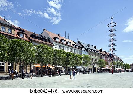 Stock Image - Market square, maypole on Maximilianstrasse, Bayreuth, Upper Franconia, Bavaria, Germany, Europe. Fotosearch