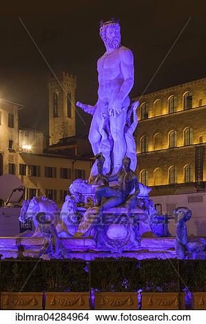 Neptune Fountain in Piazza della Signoria at night, behind historical buildings and tower, Florence, Tuscany, Italy, Europe View Large Photo Image Picture - Neptune Fountain in Piazza della Signoria at night, behind historical buildings and tower, Florence, Tuscany, Italy, Europe. Fotosearch