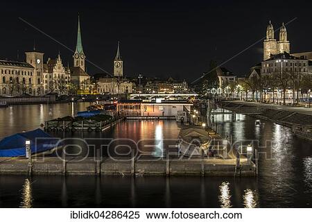 Stock Photography - Night scene, view from the Quai Bridge on the River Limmat, Fraumunster, St Peter and Grossmunster, Zurich, Zurich, Switzerland, Europe. Fotosearch