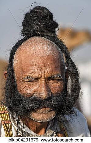 Portrait of a senior Rajasthani with a long beard, Pushkar, Rajasthan, India, Asia View Large Photo Image Stock Photo - Portrait of a senior Rajasthani with a long beard, Pushkar, Rajasthan, India, Asia. Fotosearch