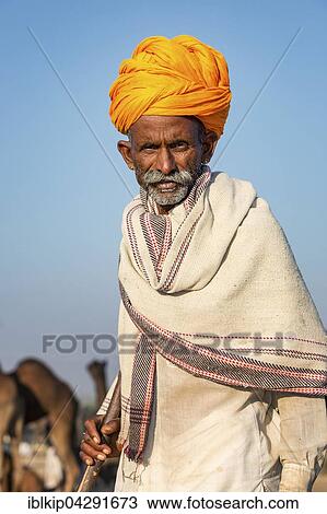 Portrait of an elderly man from Rajasthan wearing a turban, Pushkar, Rajasthan, India, Asia View Large Photo Image Stock Image - Portrait of an elderly man from Rajasthan wearing a turban, Pushkar, Rajasthan, India, Asia. Fotosearch
