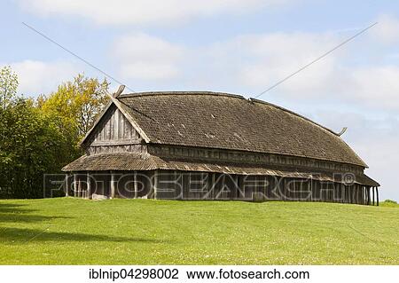 Stock Image - Reconstructed Viking longhouse, Trelleborg Museum of the Viking Age, Slagelse, Zealand, Denmark, Europe. Fotosearch
