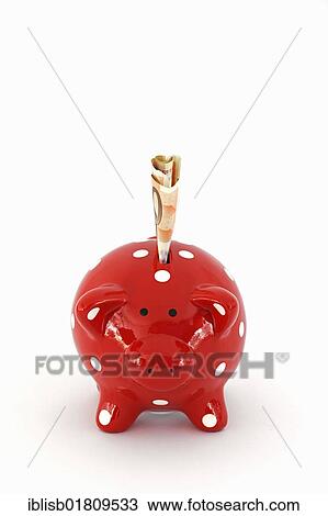 Stock Image - Red piggy bank with white dots and 50-euro notes. Fotosearch