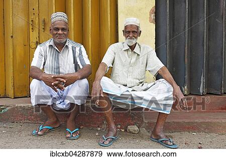 Stock Photo - Religious Muslims with caps and white beards, Pettah, Colombo, Sri Lanka, Asia. Fotosearch