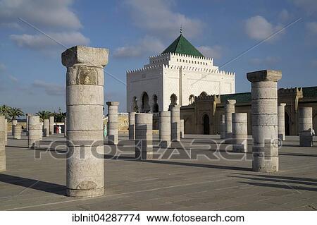 Remains of columns of the former prayer hall of the Hassan Mosque, with the Mausoleum of Mohammed V, Rabat, Rabat province, Morocco, Africa View Large Photo Image Picture - Remains of columns of the former prayer hall of the Hassan Mosque, with the Mausoleum of Mohammed V, Rabat, Rabat province, Morocco, Africa. Fotosearch