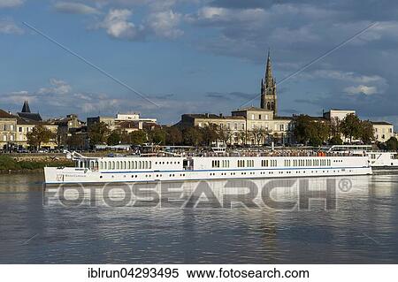 Stock Photography - River cruise ship on the Dordogne river, Libourne, Departement Gironde, France, Europe. Fotosearch