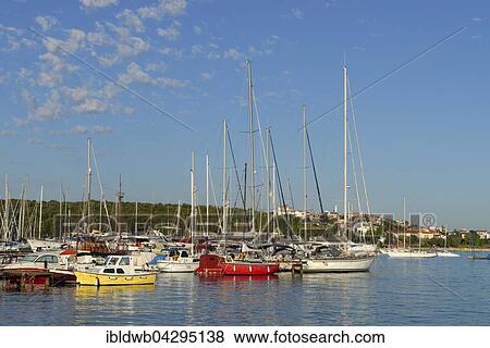 Sailing boats in Marina Veruda, yacht harbour, Pula behind, Istria, Croatia, Europe View Large Photo Image Stock Photo - Sailing boats in Marina Veruda, yacht harbour, Pula behind, Istria, Croatia, Europe. Fotosearch
