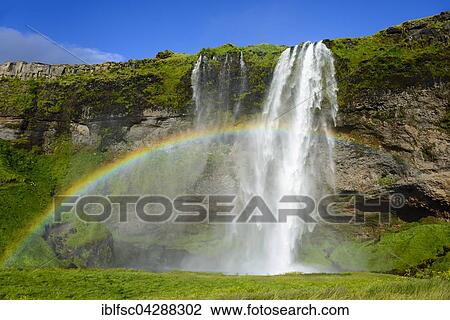 Seljalandsfoss Waterfall with rainbow, Seljalandsa river, Suourland, Iceland, Europe View Large Photo Image Stock Image - Seljalandsfoss Waterfall with rainbow, Seljalandsa river, Suourland, Iceland, Europe. Fotosearch