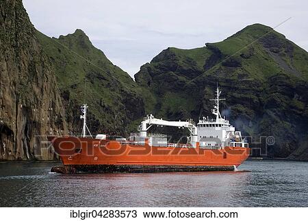Ship entering the port of Heimaey, Heimaey Island, Iceland, Europe View Large Photo Image Stock Image - Ship entering the port of Heimaey, Heimaey Island, Iceland, Europe. Fotosearch
