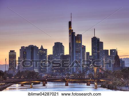 Skyline, Financial District at dusk, TaunusTurm, Tower 185, Commerzbank, Messeturm, Helaba Landesbank Hessen, German Bank, Frankfurt, Flosserbrucke, Frankfurt am Main, Hesse, Germany, Europe View Large Photo Image Stock Image - Skyline, Financial District at dusk, TaunusTurm, Tower 185, Commerzbank, Messeturm, Helaba Landesbank Hessen, German Bank, Frankfurt, Flosserbrucke, Frankfurt am Main, Hesse, Germany, Europe. Fotosearch