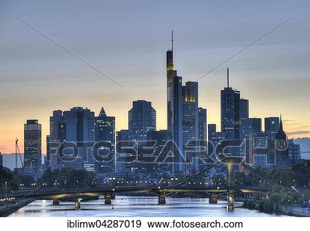 Skyline, Financial District at dusk, TaunusTurm, Tower 185, Commerzbank, Messeturm, Helaba Landesbank Hessen, German Bank, Frankfurt, Flosserbrucke, Frankfurt am Main, Hesse, Germany, Europe View Large Photo Image Stock Photo - Skyline, Financial District at dusk, TaunusTurm, Tower 185, Commerzbank, Messeturm, Helaba Landesbank Hessen, German Bank, Frankfurt, Flosserbrucke, Frankfurt am Main, Hesse, Germany, Europe. Fotosearch
