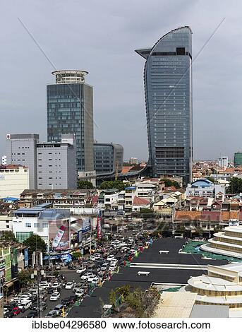 Stock Image - Skyline with Canadia Bank and Vattanac Capital Tower, Central Market Phsar Thmei in front, cityscape, Phnom Penh, Cambodia, Asia. Fotosearch