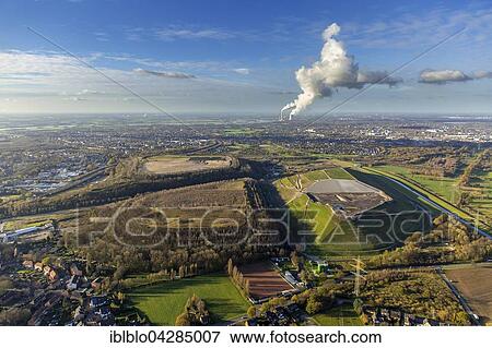 Slag heaps and Wehofen landfill, behind Dinslaken, Ruhr district, North Rhine-Westphalia, Germany, Europe View Large Photo Image Stock Photo - Slag heaps and Wehofen landfill, behind Dinslaken, Ruhr district, North Rhine-Westphalia, Germany, Europe. Fotosearch