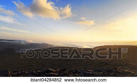 Stock Image - Slate plateau Nordkapplataet at the North Cape, midnight sun, North Cape municipality, Mageroya, Finnmark County, Norway, Europe. Fotosearch