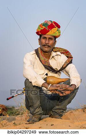 Stock Photo - Snake charmer at Pushkar, Rajasthan, India, Asia. Fotosearch