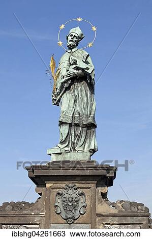 Stock Image - Statue, St. John of Nepomuk, Charles Bridge, Prague, Czech Republic, Europe. Fotosearch