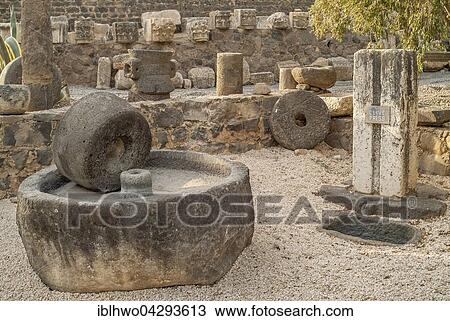 Stock Image - Stone implements, fragments of pillars, Capernaum excavations, biblical village, Sea of Galilee, Israel, Asia. Fotosearch
