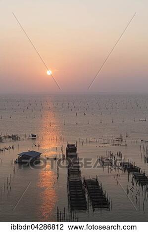 Sunset over Songkhla Lake, Thale Sap Songkhla, Thailand, Asia View Large Photo Image Stock Image - Sunset over Songkhla Lake, Thale Sap Songkhla, Thailand, Asia. Fotosearch