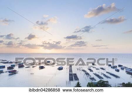 Sunset over Songkhla Lake, Thale Sap Songkhla, Thailand, Asia View Large Photo Image Stock Photo - Sunset over Songkhla Lake, Thale Sap Songkhla, Thailand, Asia. Fotosearch