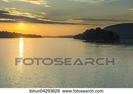 Sunset over the Danube, between Budapest and Visegrad, Hungary, Europe View Large Photo Image Stock Photo - Sunset over the Danube, between Budapest and Visegrad, Hungary, Europe. Fotosearch