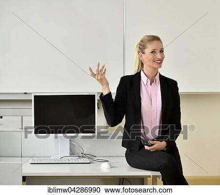 Teacher, tutor, trainer, IT room, white-board View Large Photo Image Stock Image - Teacher, tutor, trainer, IT room, white-board. Fotosearch