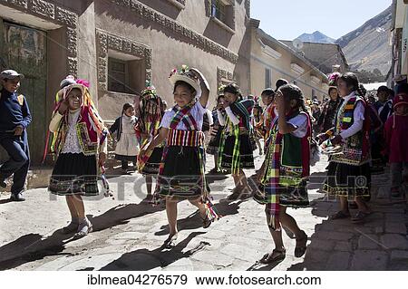 Stock Photo - Traditionally dressed children in a festive procession during a Fiesta, Colquechaca in Potosi, Bolivia, South America. Fotosearch
