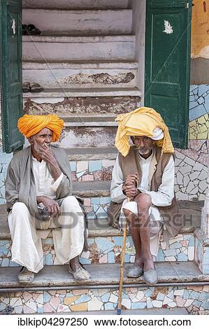 Stock Image - Two elderly Rajasthani men with turbans, Pushkar, Rajasthan, India, Asia. Fotosearch