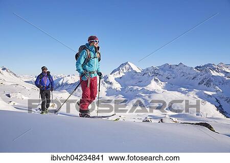 Stock Image - Two ski tourers during ascent, Kuhtai, Tyrol, Austria, Europe. Fotosearch