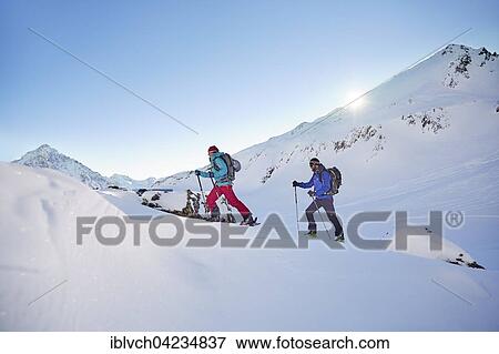 Stock Photo - Two ski tourers during ascent, Kuhtai, Tyrol, Austria, Europe. Fotosearch