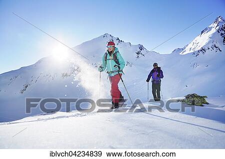 Stock Photo - Two ski tourers during ascent, Kuhtai, Tyrol, Austria, Europe. Fotosearch