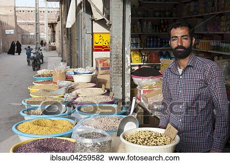 Vendor of legumes and spices, bazaar of Kerman, Iran, Asia View Large Photo Image Stock Image - Vendor of legumes and spices, bazaar of Kerman, Iran, Asia. Fotosearch