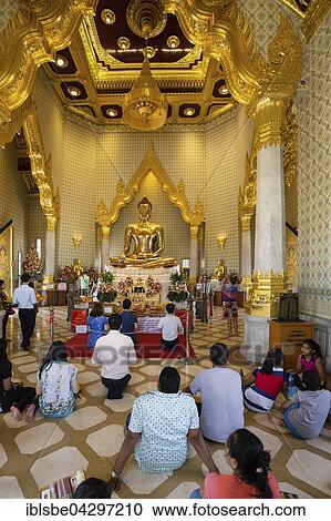Wat Traimit, worshippers in temple of Golden Buddha, Phra Maha Suwan Patimakon Phuttha, Trimitr, Bangkok, Thailand, Asia View Large Photo Image Stock Image - Wat Traimit, worshippers in temple of Golden Buddha, Phra Maha Suwan Patimakon Phuttha, Trimitr, Bangkok, Thailand, Asia. Fotosearch