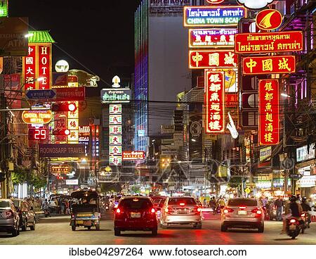 Yaowarat Road in Chinatown, neon signs at night, people and cars, commercial street, billboards, nightlife, Bangkok, Thailand, Asia View Large Photo Image Picture - Yaowarat Road in Chinatown, neon signs at night, people and cars, commercial street, billboards, nightlife, Bangkok, Thailand, Asia. Fotosearch