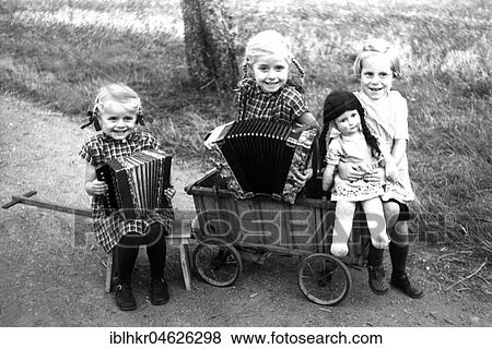 2 girls playing accordion, 1945, ca. 1955, Leipzig, Germany, Europe View Large Photo Image Stock Photo - 2 girls playing accordion, 1945, ca. 1955, Leipzig, Germany, Europe. Fotosearch