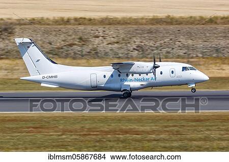 Picture - A Fairchild Dornier 328 aircraft of Rhein-Neckar Air with the registration D-CMHB takes off from Kassel Calden Airport (KSF), Kassel, Germany, Europe. Fotosearch