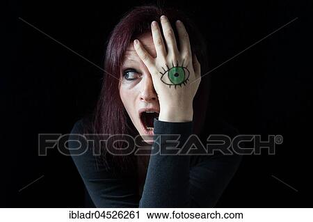 A screaming woman with a painted eye on her hands View Large Photo Image Stock Image - A screaming woman with a painted eye on her hands. Fotosearch