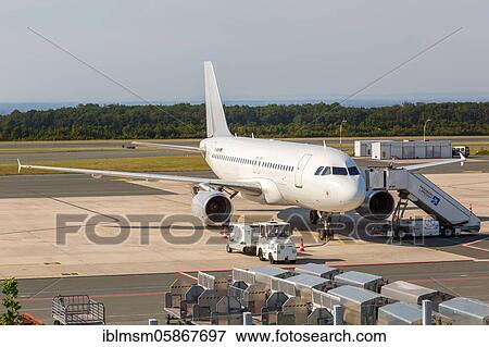 A Sundair Airbus A319 aircraft with registration mark D-ASMF at Paderborn Lippstadt Airport (PAD), Ahden, Germany, Europe View Large Photo Image Stock Photo - A Sundair Airbus A319 aircraft with registration mark D-ASMF at Paderborn Lippstadt Airport (PAD), Ahden, Germany, Europe. Fotosearch
