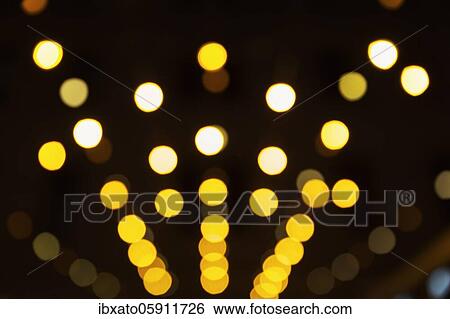 Abstract dark background with sparkling yellow lights, Budapest, Hungary, Europe View Large Photo Image Stock Photograph - Abstract dark background with sparkling yellow lights, Budapest, Hungary, Europe. Fotosearch