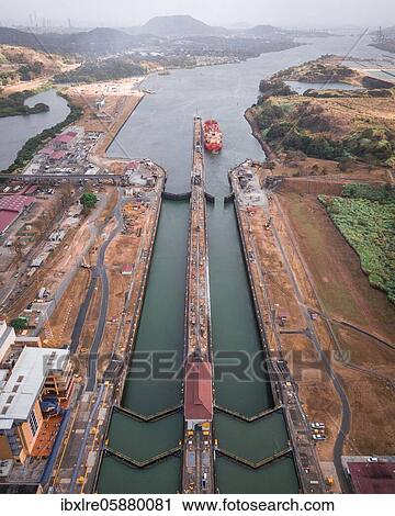 Aerial view, cargo ship at the lock in the Panama Canal from above, Mirador Miraflores, Panama, Central America View Large Photo Image Stock Image - Aerial view, cargo ship at the lock in the Panama Canal from above, Mirador Miraflores, Panama, Central America. Fotosearch