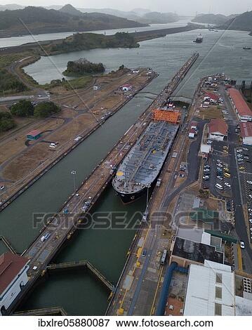 Aerial view, cargo ship at the lock in the Panama Canal from above, Mirador Miraflores, Panama, Central America View Large Photo Image Stock Photo - Aerial view, cargo ship at the lock in the Panama Canal from above, Mirador Miraflores, Panama, Central America. Fotosearch