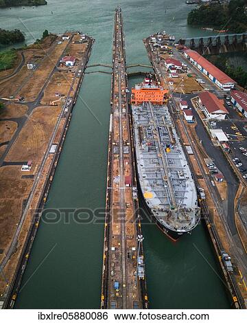 Aerial view, cargo ship at the lock in the Panama Canal from above, Mirador Miraflores, Panama, Central America View Large Photo Image Stock Photograph - Aerial view, cargo ship at the lock in the Panama Canal from above, Mirador Miraflores, Panama, Central America. Fotosearch