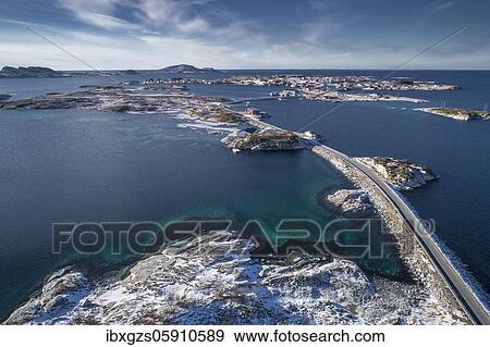 Aerial view, country road connecting small, winterly islands in the sea, Herøy, Nordland, Norway, Europe View Large Photo Image Stock Photo - Aerial view, country road connecting small, winterly islands in the sea, Herøy, Nordland, Norway, Europe. Fotosearch