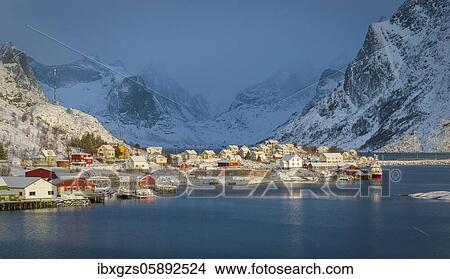 Aerial view, fishing village Reine in winter at dawn, snowy landscape, Reinefjord, Moskenesøya, Nordland, Lofoten, Norway, Europe View Large Photo Image Picture - Aerial view, fishing village Reine in winter at dawn, snowy landscape, Reinefjord, Moskenesøya, Nordland, Lofoten, Norway, Europe. Fotosearch