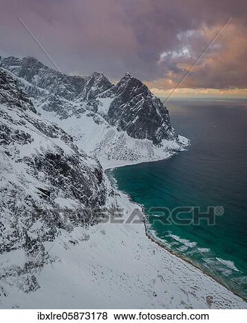 Aerial view, Kvalvika beach in winter with snow, Ryten mountain tops, Fredvang, Lofoten, Nordland, Norway, Europe View Large Photo Image Stock Photo - Aerial view, Kvalvika beach in winter with snow, Ryten mountain tops, Fredvang, Lofoten, Nordland, Norway, Europe. Fotosearch