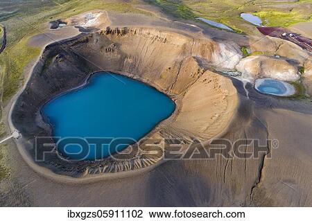 Stock Image - Aerial view of blue lake in the Viti volcano crater at Krafla power plant, Mývatn region, Skútustaðir, Norðurland eystra, Iceland, Europe. Fotosearch