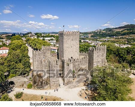Aerial view of castle of Guimaraes, first capital of Portugal View Large Photo Image Stock Photo - Aerial view of castle of Guimaraes, first capital of Portugal. Fotosearch